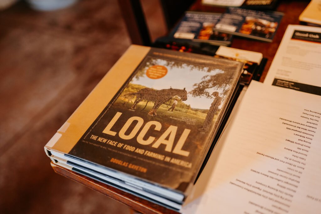 ARD_5903 A book cover that says "Local: The new face of food and farming in America"