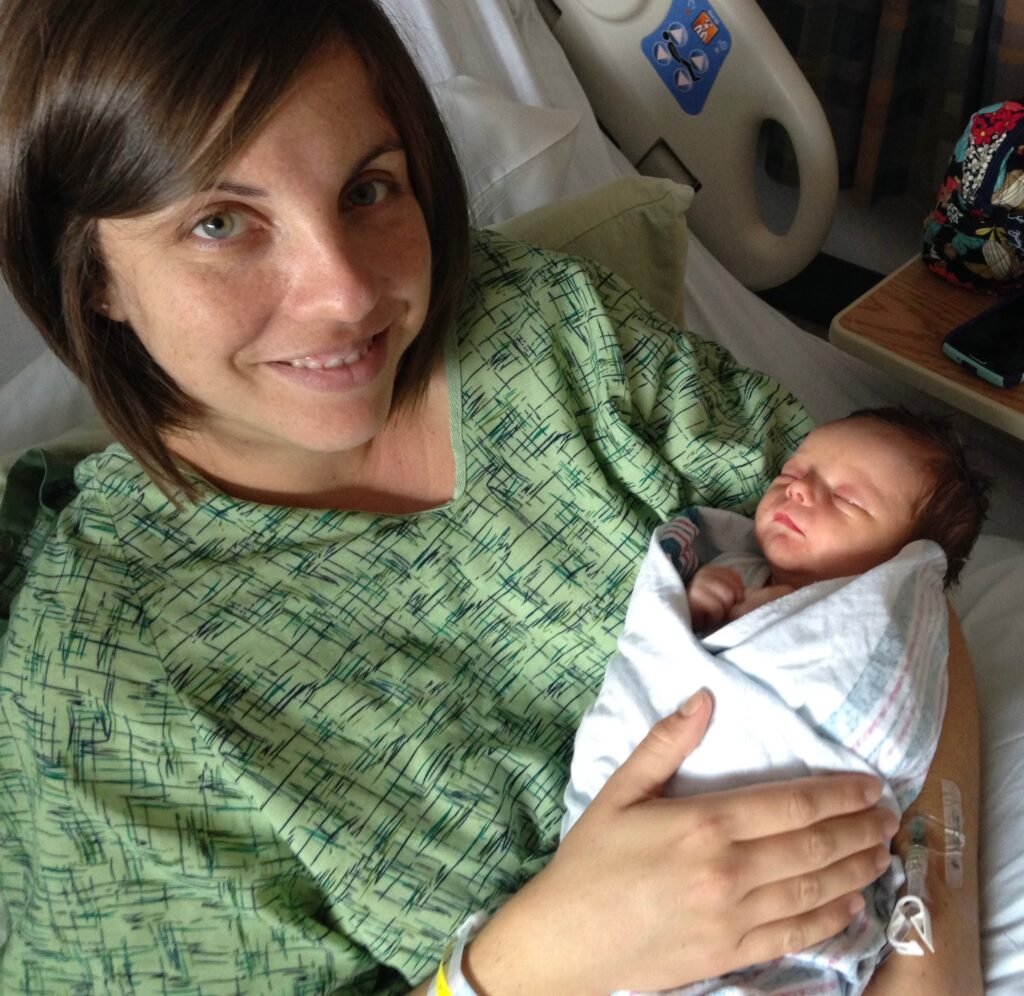 Nadine Long in the hospital with her newborn baby.