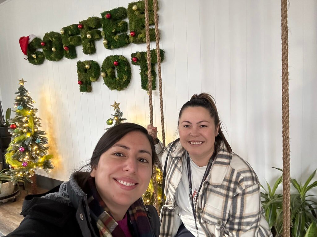 Christina Ahumada smiling with a friend.