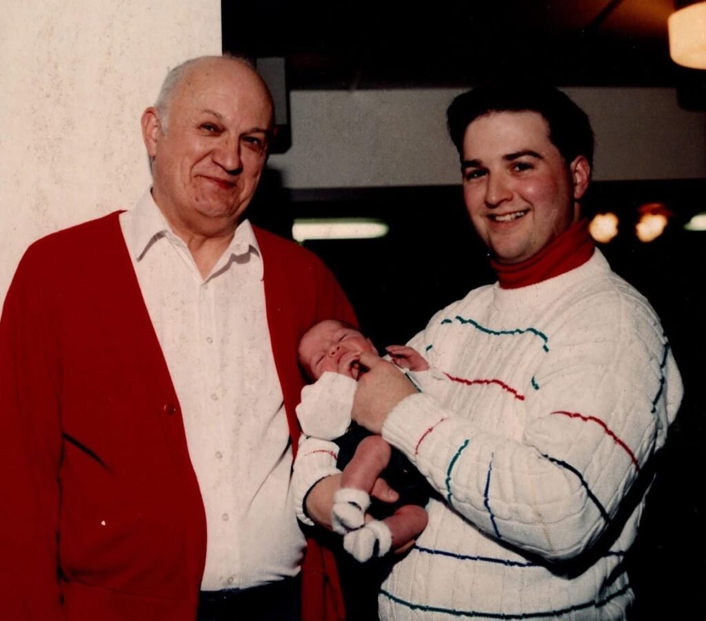 John Steyer with his father and newborn child.