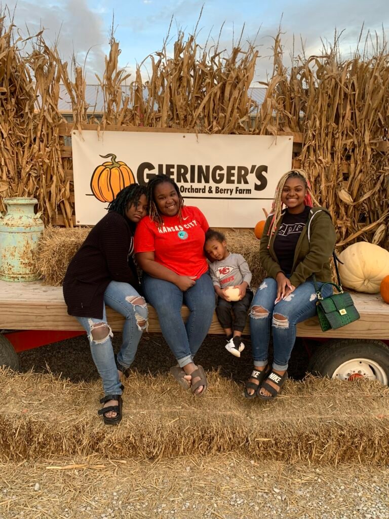 Rachel Russell with family at pumpkin patch